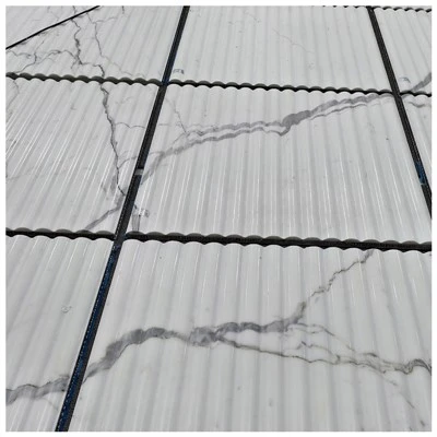 Calacatta marmor riflet flise